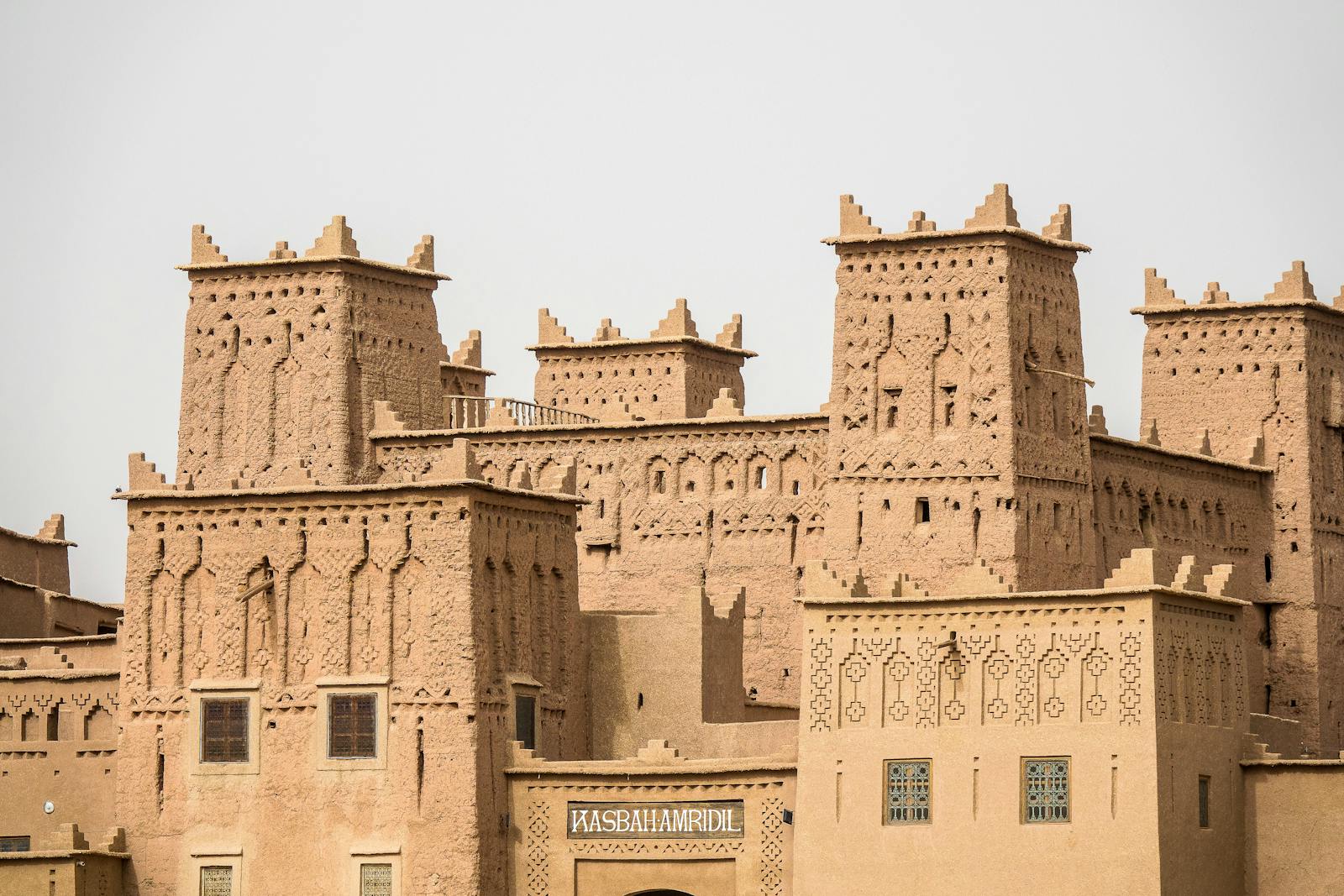 Experience the intricate designs of a traditional Moroccan kasbah under the sun, reflecting cultural heritage.